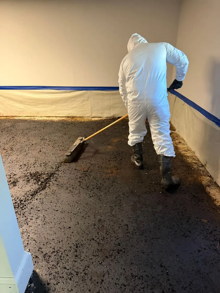 Protective-equipment work during controlled material cleaning