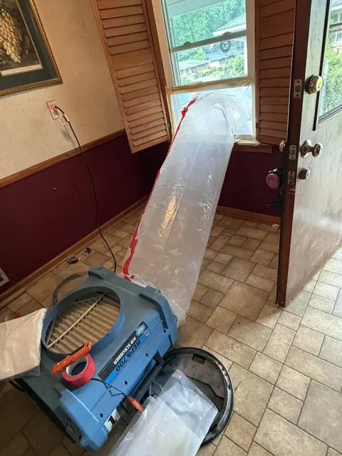 HEPA air scrubber with window exhaust for negative air pressure