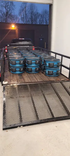 Trailer loaded with axial air movers ready for deployment